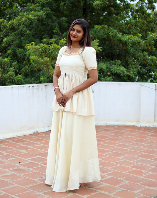 Stunning Ivory Peplum Top & Skirt Set