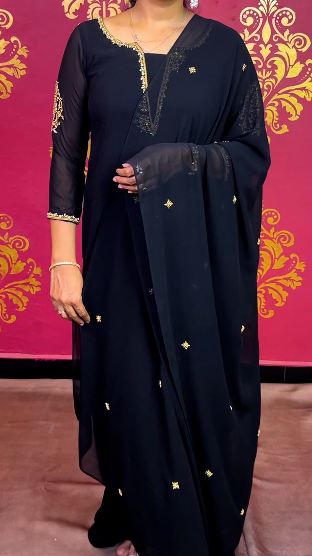 Sleek Black Georgtte Kurti Set with Dupatta - Golden Embroidered Shine