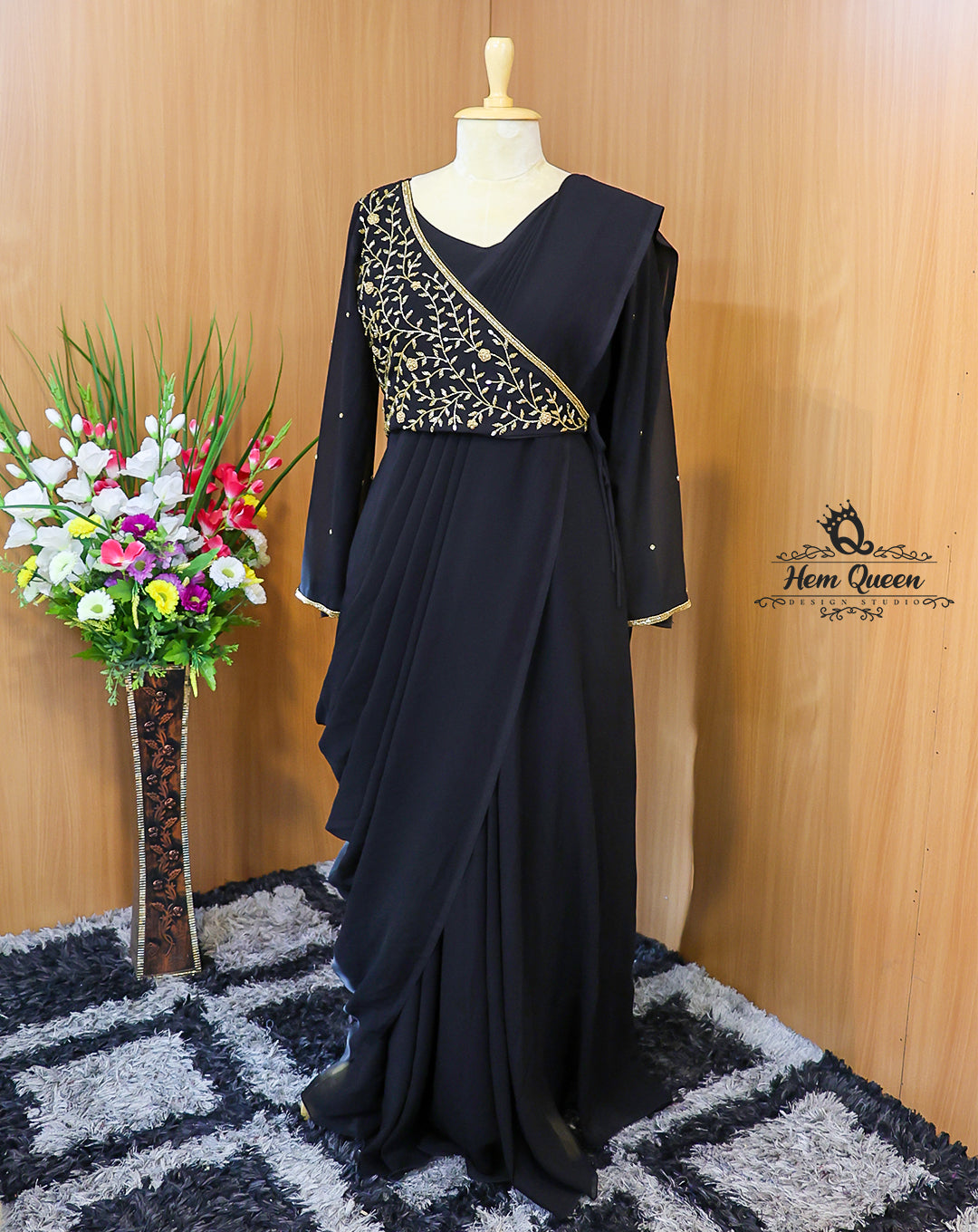 This Overlapping Draped Maxi Dress is a stunning blend of modern elegance and traditional charm. Crafted from rich, flowy fabric, the gown features a unique overlapping drape, full-length sleeves, and delicate gold embroidery that adds a touch of royalty. Perfect for evening parties, festive gatherings, or formal occasions.
Designed for women who want to make a graceful yet bold statement.
Highlights:
Elegant black shade with golden embroidery
Overlapping draped silhouette for a flattering fit