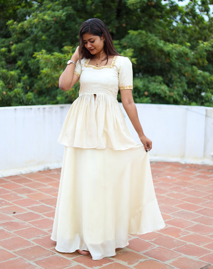 Stunning Ivory Peplum Top & Skirt Set