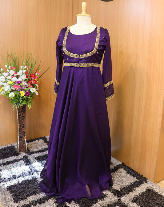 Step into timeless elegance with our Regal Violet Circular Maxi, paired with a majestic overcoat adorned in intricate golden detailing. Crafted for festive evenings, weddings, and special celebrations, this ensemble brings together traditional charm and contemporary sophistication. The rich purple hue and royal silhouette ensure all eyes are on you.

✨ Fabric: Premium-quality material for comfort and grace
👑 Style: Floor-length circular maxi with detachable overcoat
🌟 Detailing: Golden embellishments 