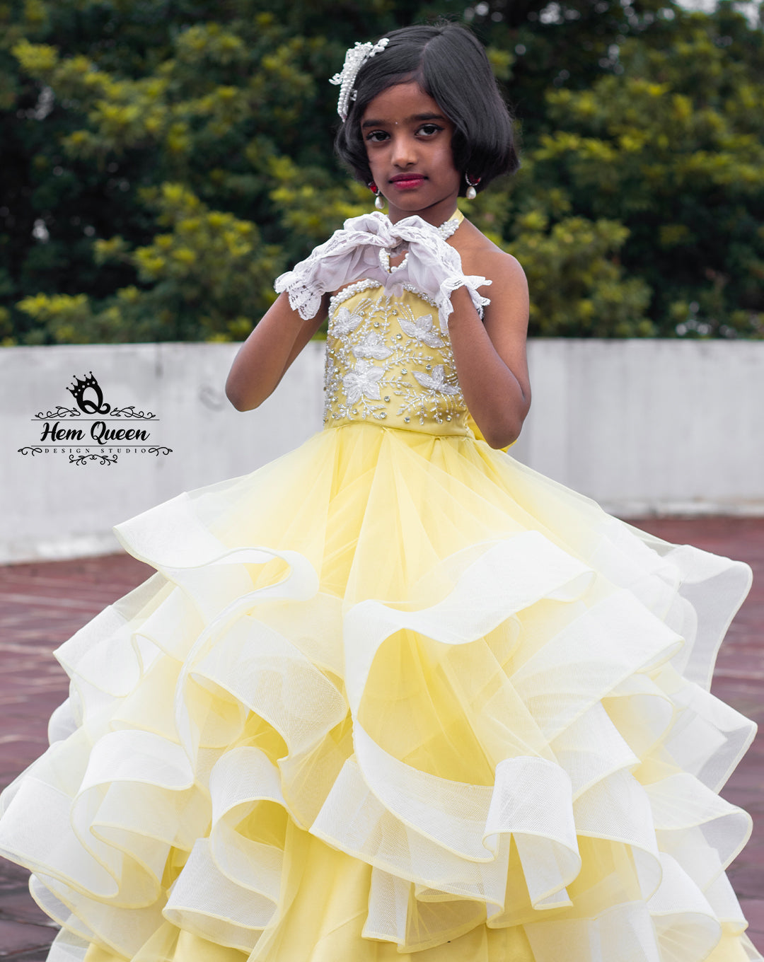 ✨ Let your little one own the look with timeless elegance! 🌼
This sunshine yellow tulle ball gown is a stunning blend of charm and sophistication. Designed with multiple layers of soft tulle, delicate pearl embellishments, and an intricately styled bodice, it's perfect for birthdays, photoshoots, pageants, or any royal celebration. 👑💛

Crafted exclusively by Hemqueen Design Studio, this gown is made to measure for your princess’s perfect fit.

Key Features:

Color: Sunshine Yellow with White Tulle Layers