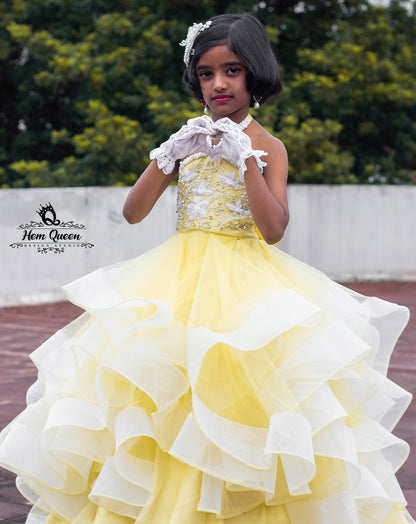 ✨ Let your little one own the look with timeless elegance! 🌼
This sunshine yellow tulle ball gown is a stunning blend of charm and sophistication. Designed with multiple layers of soft tulle, delicate pearl embellishments, and an intricately styled bodice, it's perfect for birthdays, photoshoots, pageants, or any royal celebration. 👑💛

Crafted exclusively by Hemqueen Design Studio, this gown is made to measure for your princess’s perfect fit.

Key Features:

Color: Sunshine Yellow with White Tulle Layers